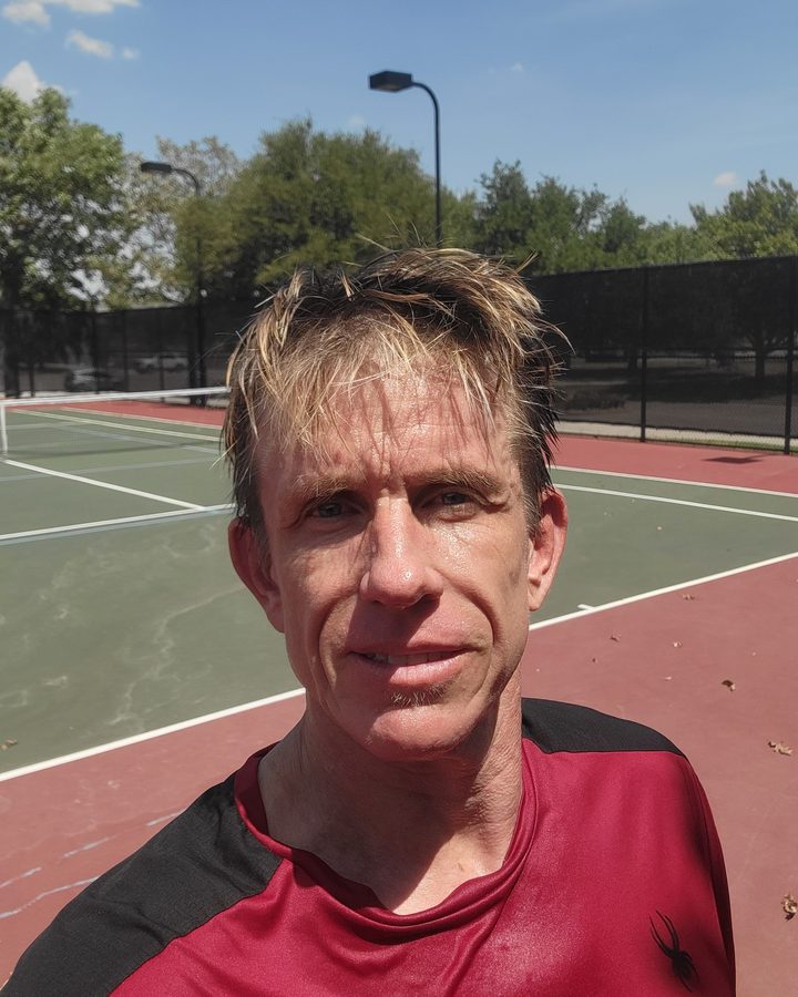 Robert Novotny on a tennis court
